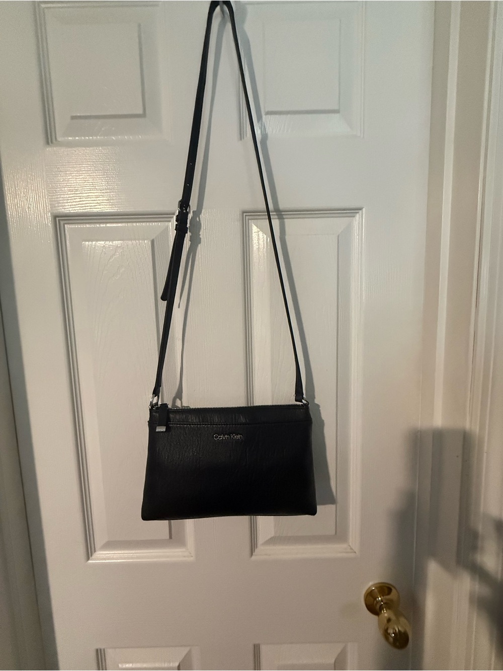 Calvin Klein Black Leather Crossbody Bag with Adjustable Strap